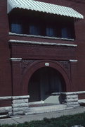 132-140 HIGH ST & 9 BROWN ST, a Romanesque Revival row house, built in Oshkosh, Wisconsin in 1897.