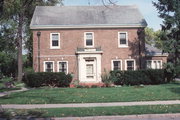 1128 WASHINGTON AVE, a Colonial Revival/Georgian Revival house, built in Oshkosh, Wisconsin in 1928.