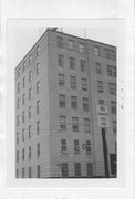 C. 122 W MAIN ST, a International Style large office building, built in Madison, Wisconsin in 1950.
