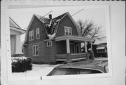 513 3RD ST, a Dutch Colonial Revival house, built in Menasha, Wisconsin in .
