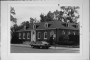 430 AHNAIP ST, a Colonial Revival/Georgian Revival small office building, built in Menasha, Wisconsin in 1919.