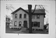 228-230 BROAD ST, a Gabled Ell house, built in Menasha, Wisconsin in 1874.