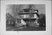 348 BROAD ST, a American Foursquare house, built in Menasha, Wisconsin in 1906.