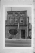 311 N COMMERCIAL ST, a Commercial Vernacular tavern/bar, built in Neenah, Wisconsin in 1888.