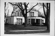 1112 E FOREST AVE, a International Style house, built in Neenah, Wisconsin in 1937.