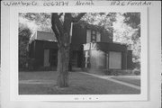 1112 E FOREST AVE, a International Style house, built in Neenah, Wisconsin in 1937.