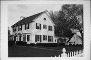 416 E WISCONSIN AVE, a Colonial Revival/Georgian Revival house, built in Neenah, Wisconsin in 1916.