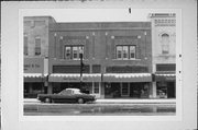 117/119 W WISCONSIN AVE, a Prairie School retail building, built in Neenah, Wisconsin in 1882.