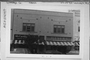 117/119 W WISCONSIN AVE, a Prairie School retail building, built in Neenah, Wisconsin in 1882.