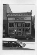 121 W MAIN ST, a Commercial Vernacular grocery store/supermarket, built in Cambridge, Wisconsin in 1900.