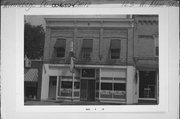 123 W MAIN ST, a Commercial Vernacular small retail building, built in Omro, Wisconsin in 1900.