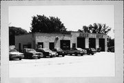310 N WEBSTER AVE, a Commercial Vernacular gas station/service station, built in Omro, Wisconsin in .
