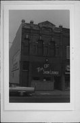 106, 106A, 106B, 108A N MAIN ST, a Commercial Vernacular small retail building, built in Oshkosh, Wisconsin in 1875.