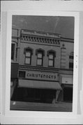 224, 224A N MAIN ST, a Italianate small retail building, built in Oshkosh, Wisconsin in 1875.