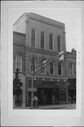 411 N MAIN ST, a Italianate retail building, built in Oshkosh, Wisconsin in 1874.