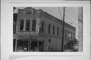 465 N MAIN ST, a Commercial Vernacular grocery, built in Oshkosh, Wisconsin in 1874.