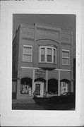 544 N MAIN ST, a Queen Anne large retail building, built in Oshkosh, Wisconsin in 1891.
