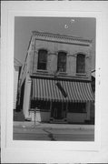 633 N MAIN ST, a Commercial Vernacular small retail building, built in Oshkosh, Wisconsin in 1889.