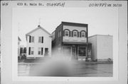 633 N MAIN ST, a Commercial Vernacular small retail building, built in Oshkosh, Wisconsin in 1889.