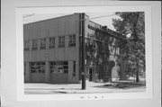 21 W NEW YORK AVE, a Italianate fire house, built in Oshkosh, Wisconsin in 1900.