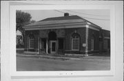 115 WASHINGTON AVE, a Neoclassical/Beaux Arts small office building, built in Oshkosh, Wisconsin in 1924.