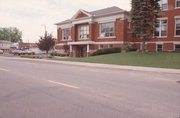 204 S MAPLE, a Neoclassical/Beaux Arts library, built in Marshfield, Wisconsin in 1900.