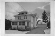 802 W 5TH ST, a American Foursquare house, built in Marshfield, Wisconsin in 1916.