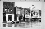 107-111 S CENTRAL AVE, a Commercial Vernacular retail building, built in Marshfield, Wisconsin in 1887.