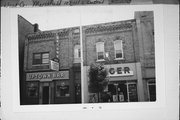 107-111 S CENTRAL AVE, a Commercial Vernacular small retail building, built in Marshfield, Wisconsin in 1887.