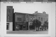 107-111 S CENTRAL AVE, a Commercial Vernacular retail building, built in Marshfield, Wisconsin in 1887.