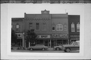 117-121 S CENTRAL AVE, a Commercial Vernacular retail building, built in Marshfield, Wisconsin in 1887.