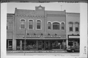 117-121 S CENTRAL AVE, a Commercial Vernacular retail building, built in Marshfield, Wisconsin in 1887.