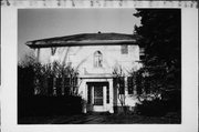 204 S CHERRY AVE, a Colonial Revival/Georgian Revival house, built in Marshfield, Wisconsin in 1926.