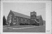 208 S CHESTNUT AVE, a Late Gothic Revival church, built in Marshfield, Wisconsin in 1924.