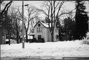 308 W PARK ST, a Queen Anne house, built in Marshfield, Wisconsin in 1902.