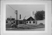 6860 STH 34, a Astylistic Utilitarian Building dairy processing facility, built in Rudolph, Wisconsin in 1915.