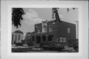 240 S 1ST AVE, a Late Gothic Revival funeral home, built in Wisconsin Rapids, Wisconsin in 1927.