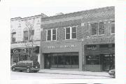 216 N MAIN ST, a Commercial Vernacular small retail building, built in Oshkosh, Wisconsin in 1920.