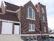 115 W MAIN ST , a Late Gothic Revival house of worship, built in Reedsburg, Wisconsin in 1923.