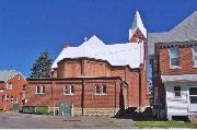 401 S WASHINGTON ST, a Late Gothic Revival church, built in Arcadia, Wisconsin in 1902.