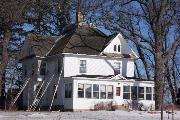 23212 WASHINGTON AVENUE / STATE HIGHWAY 20, a Queen Anne house, built in Dover, Wisconsin in 1905.