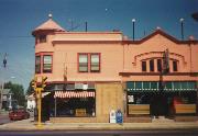 300 N COMMERCIAL ST, a Queen Anne large retail building, built in Neenah, Wisconsin in 1879.