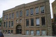 110 ALGOMA BLVD, a Romanesque Revival large office building, built in Oshkosh, Wisconsin in 1887.