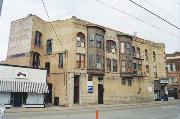 501-509 N MAIN ST, a Queen Anne retail building, built in Oshkosh, Wisconsin in 1895.