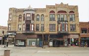 501-509 N MAIN ST, a Queen Anne retail building, built in Oshkosh, Wisconsin in 1895.