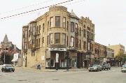 501-509 N MAIN ST, a Queen Anne large retail building, built in Oshkosh, Wisconsin in 1895.