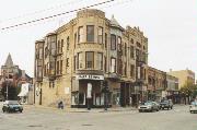 501-509 N MAIN ST, a Queen Anne retail building, built in Oshkosh, Wisconsin in 1895.