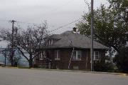 27 S 1st St, a One Story Cube house, built in Winneconne, Wisconsin in 1915.