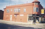 300 N COMMERCIAL ST, a Queen Anne large retail building, built in Neenah, Wisconsin in 1879.