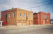 300 N COMMERCIAL ST, a Queen Anne large retail building, built in Neenah, Wisconsin in 1879.